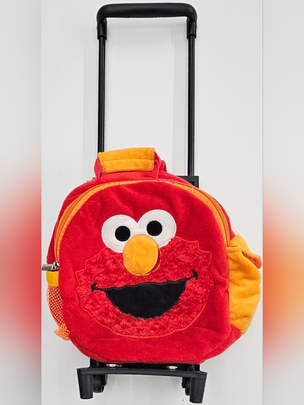 Animal Adventure Sesame Street Elmo Plush Trolley Backpack Rolling Luggage Bag